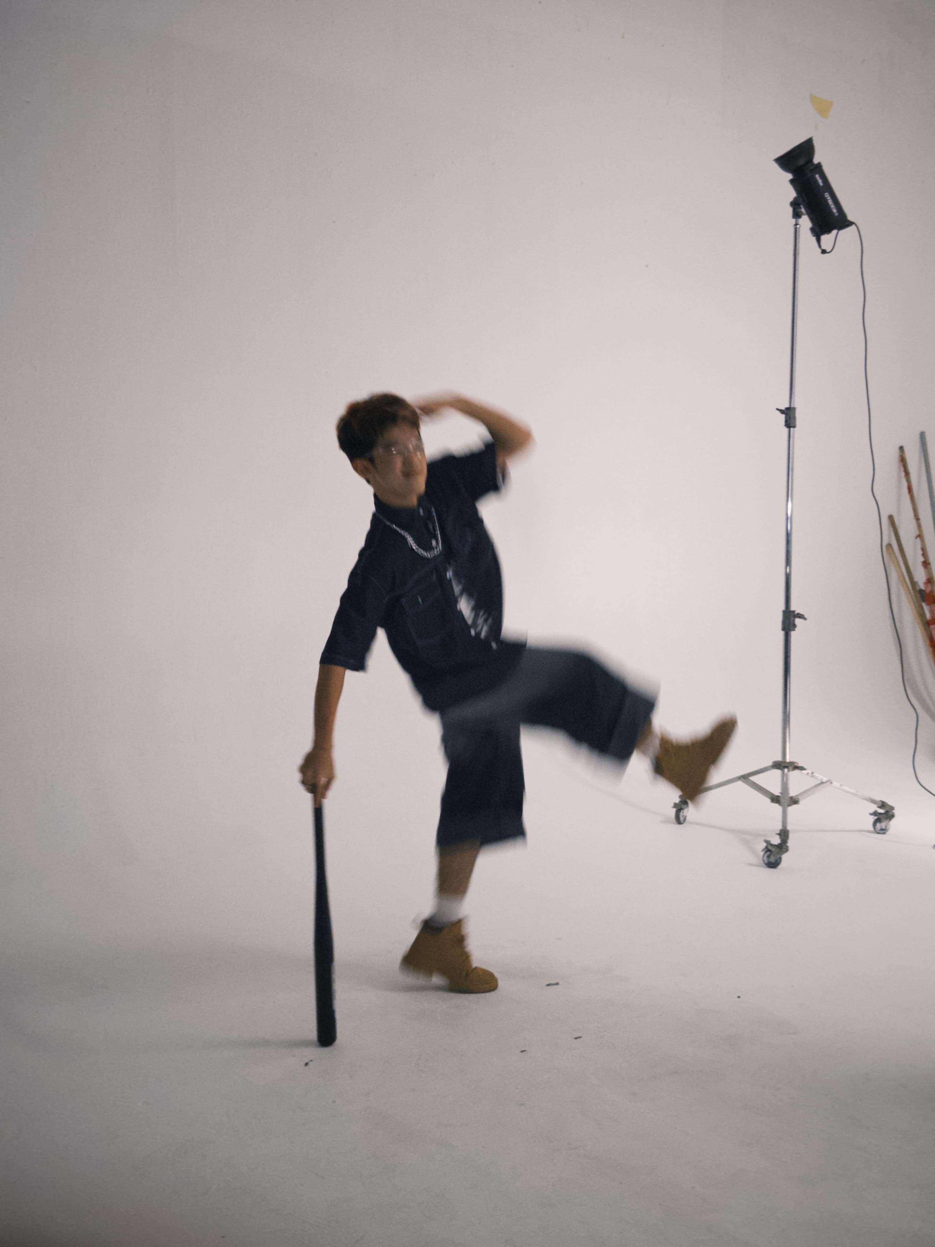 Ddoofi mid-motion in a studio